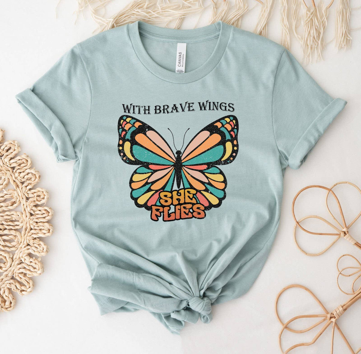 With Brave Wings She Flies T-shirt